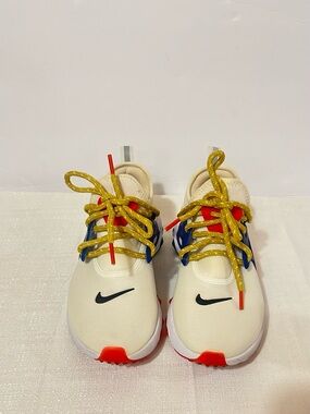 Nike Kids' Cream Running Shoes with Yellow Laces and Red Accent size 6